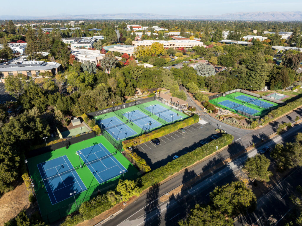 Tennis courts at University Club of Palo Alto. Two of the tennis courts were done using the slipsheet method and Greenset colors in apple green and dark blue. The other 3 tennis courts were resurfaced using Plexipave acrylic resurfacer in dark blue and medium green.
